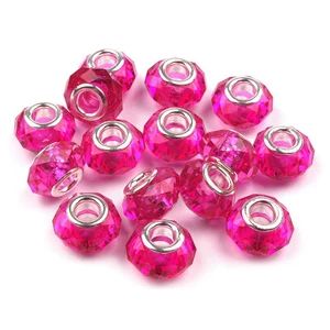 Csiszolt nagylyukú gyöngy köztes 14,5x9 mm átlátszó málna