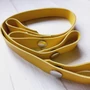 Kép 1/2 - Bőr táskapánt patentos 50 cm - sárga